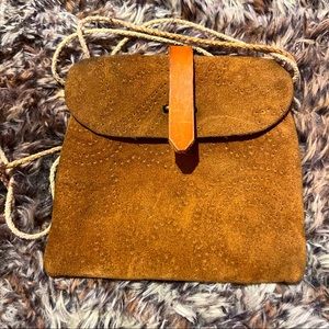 Small real leather vintage satchel. Brown with detailed print. Previously loved